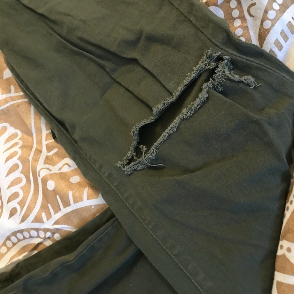 Olive green jeans w/ ripped knee detail